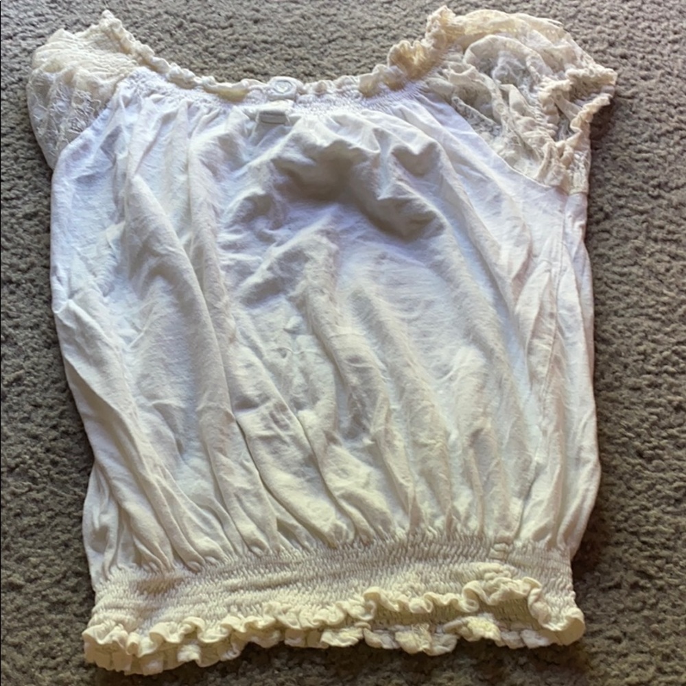 A white fancy crop top